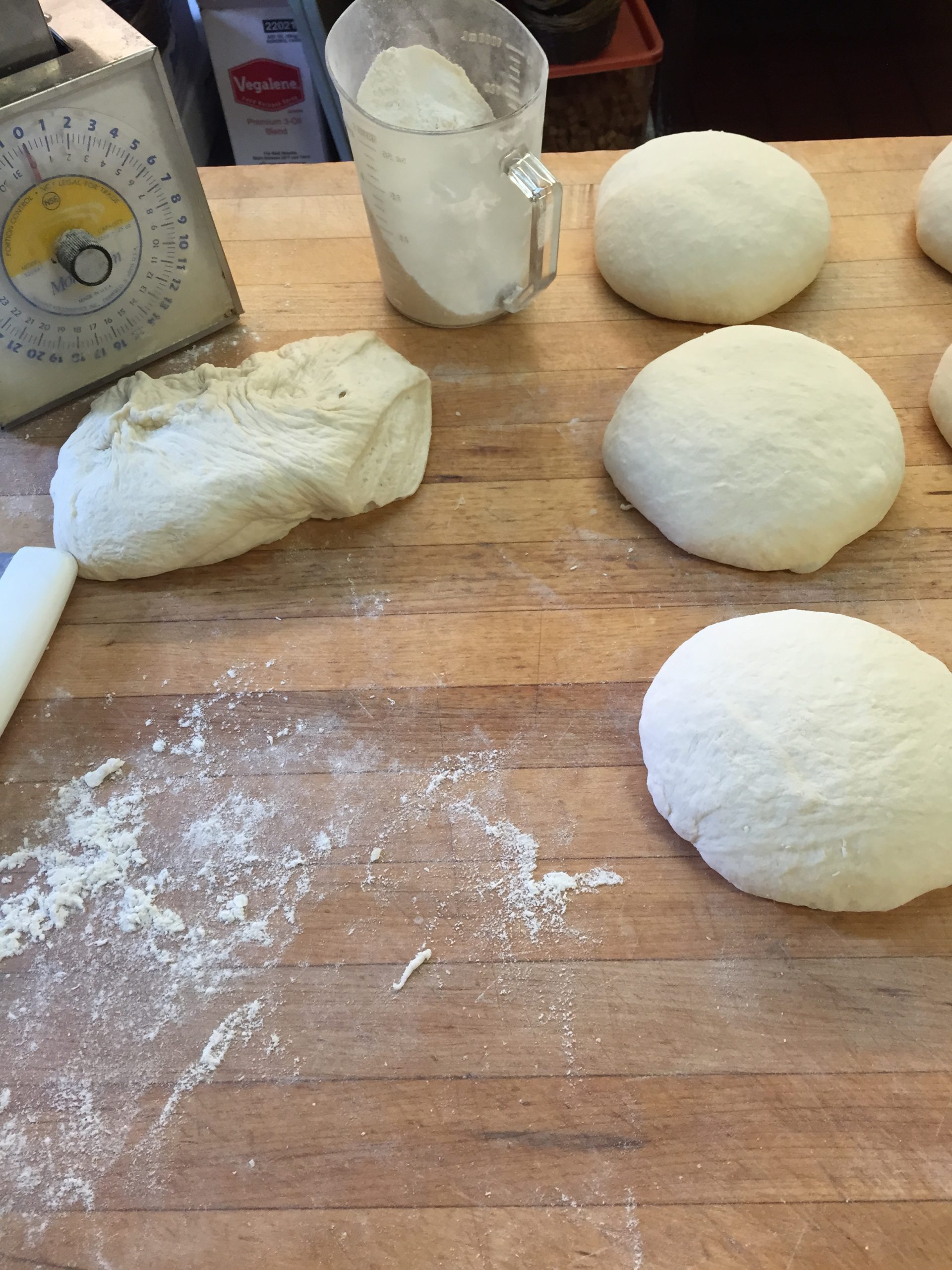 Balls of dough on counter top